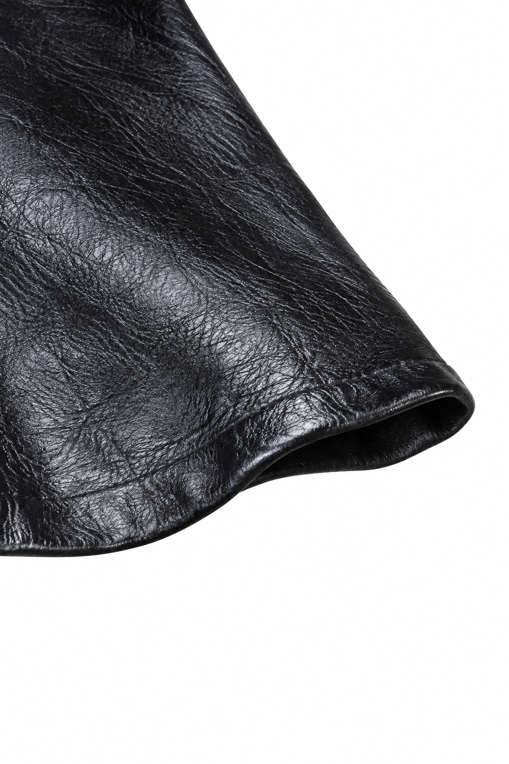 Abito in ecopelle Nero, dettaglio della porzione visibile dell’orlo.