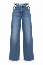 Jeans Stella crystal cut-out in denim blu, vista frontale intera non indossata con vita sfrangiata, aperture con strass e gambe ampie.